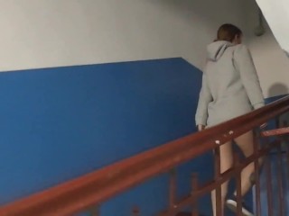 Girl with shaved pussy walked bottomless on the public stairs